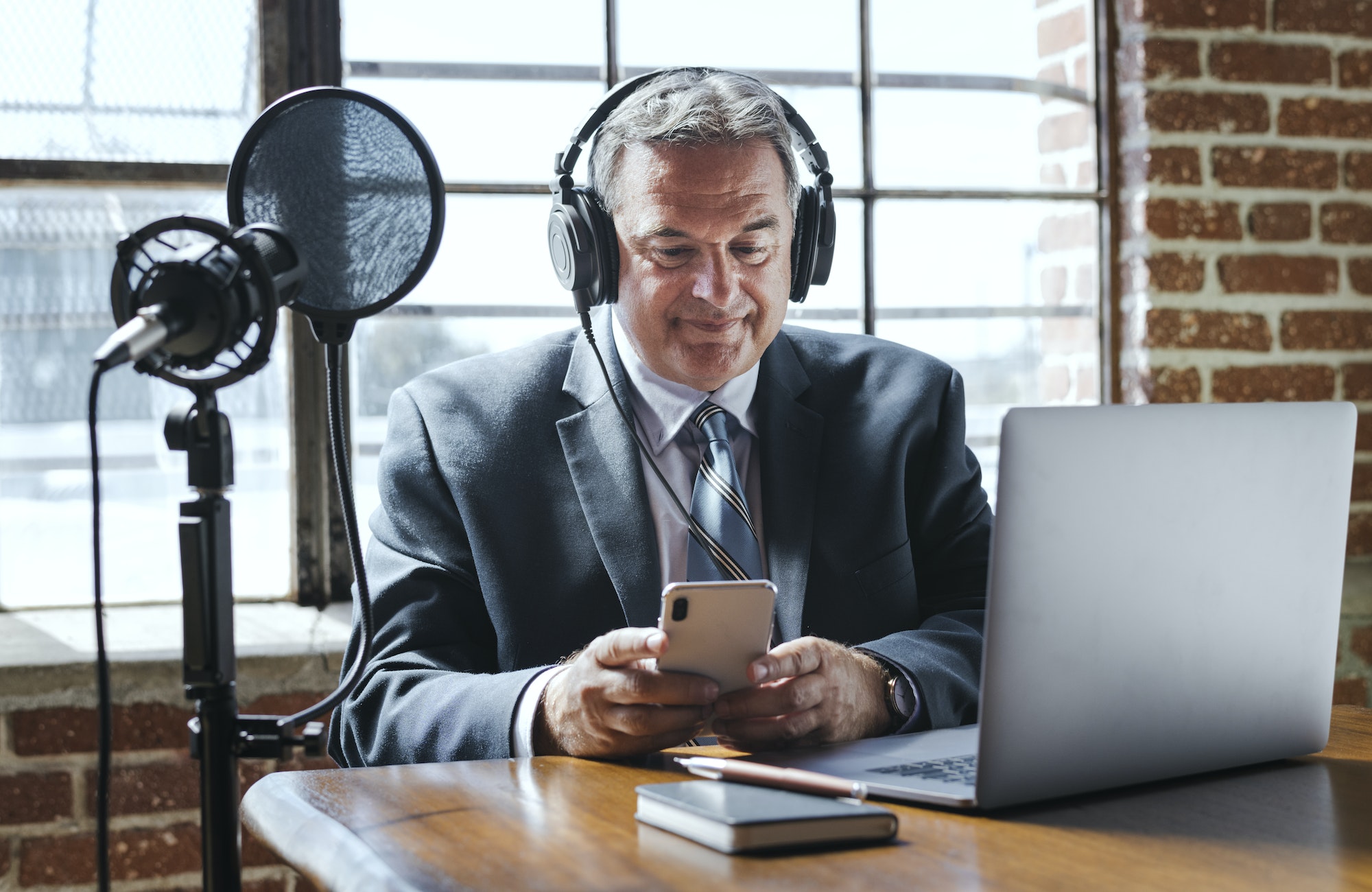 businessman-recording-a-podcast.jpg businessman-recording-a-podcast.jpg