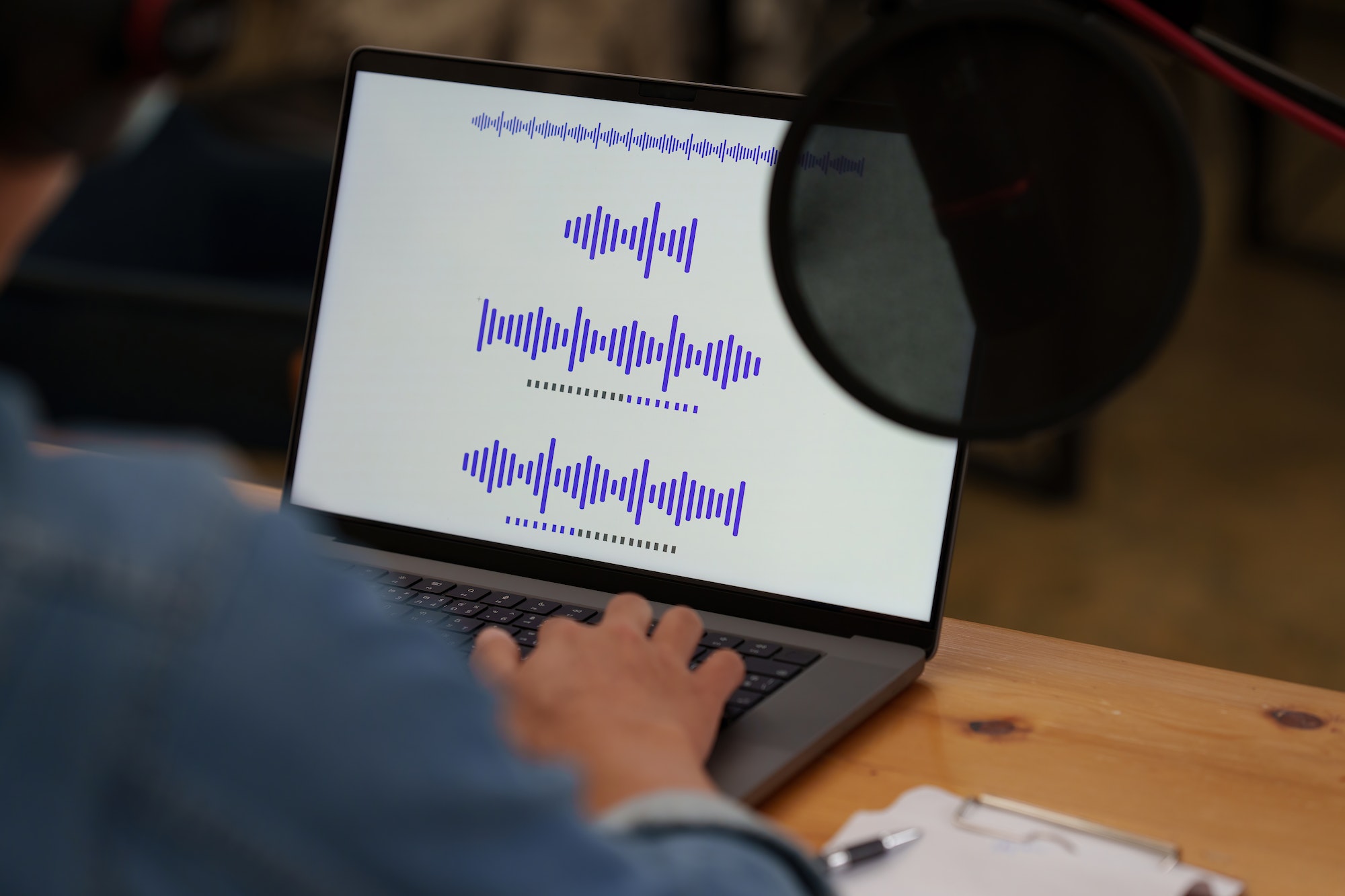podcaster-editing-audio-podcast-working-at-home-studio.jpg podcaster-editing-audio-podcast-working-at-home-studio.jpg