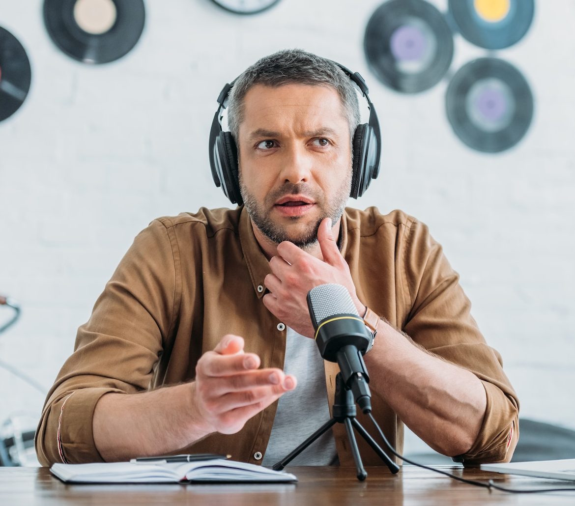 thoughtful-radio-host-in-headphones-recording-podcast-in-broadcasting-studio-e1664708812456.jpg thoughtful-radio-host-in-headphones-recording-podcast-in-broadcasting-studio-e1664708812456.jpg